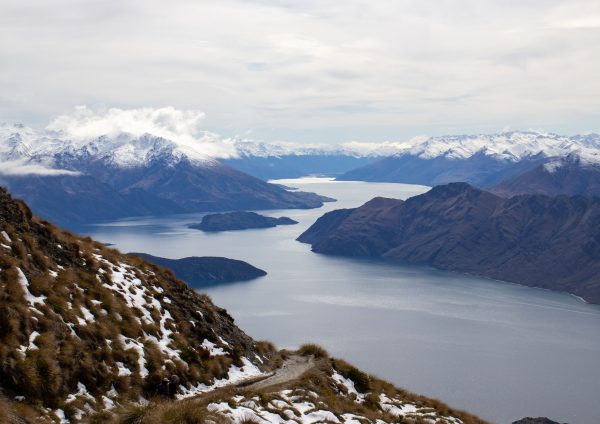 lake, tussock, mountains and snow